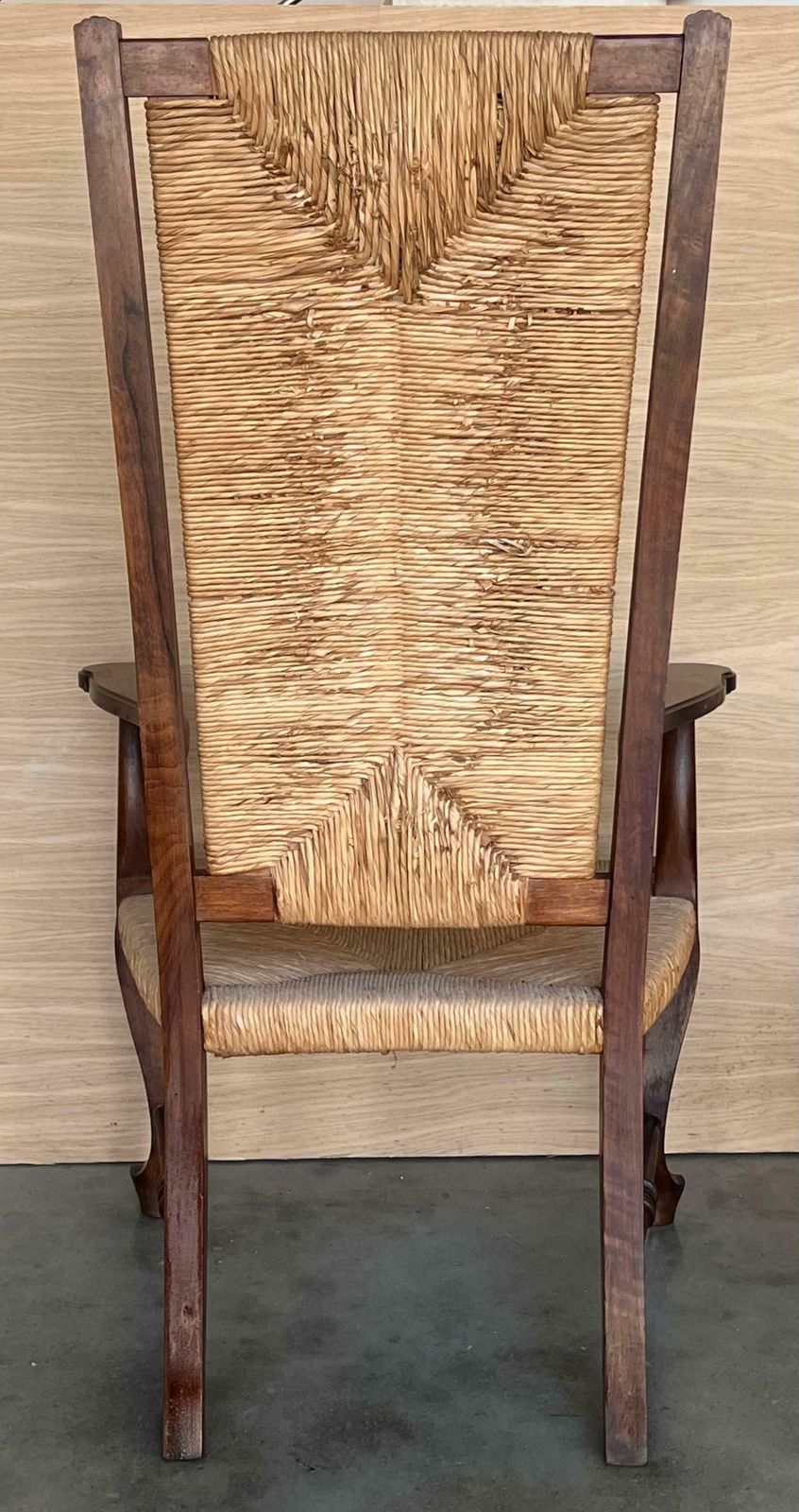 photo furniture Paire de fauteuils espagnols en noyer à dossier et assise cannés, XXe siècle
