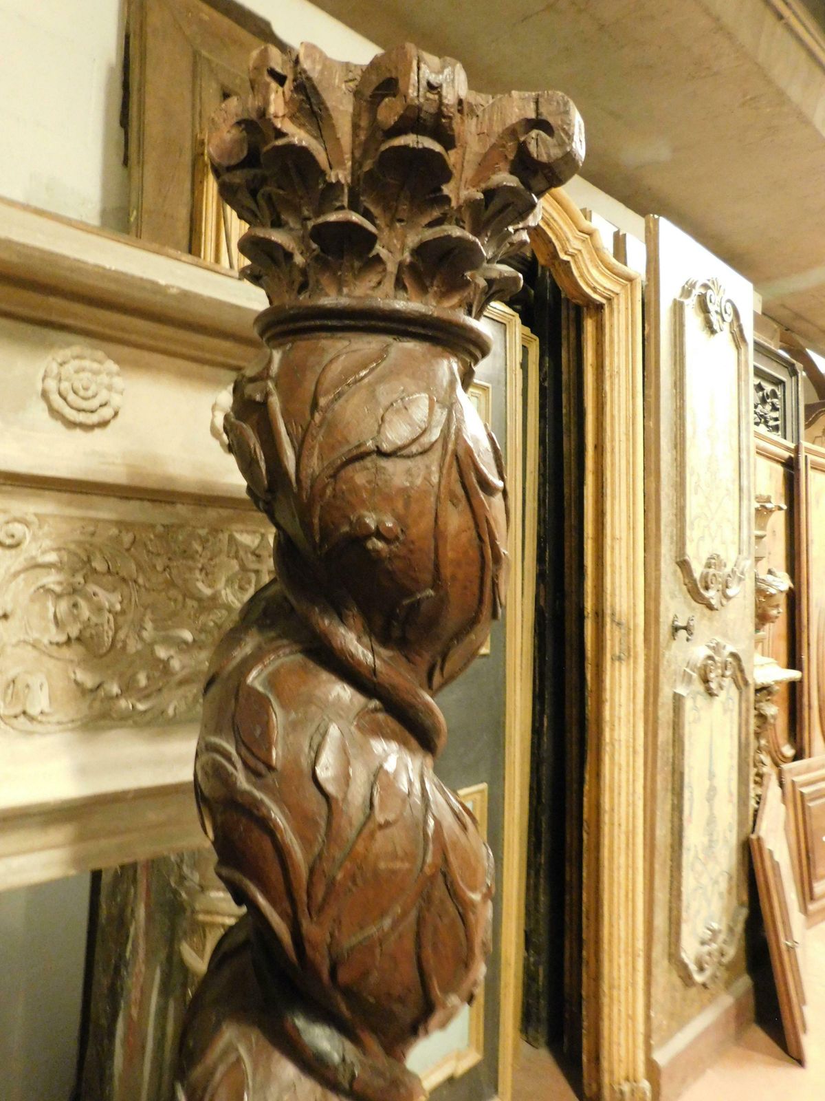 photo for sale Column In Dark Brown Walnut Wood, Hand Sculpted With A Twisted Shape, Italy