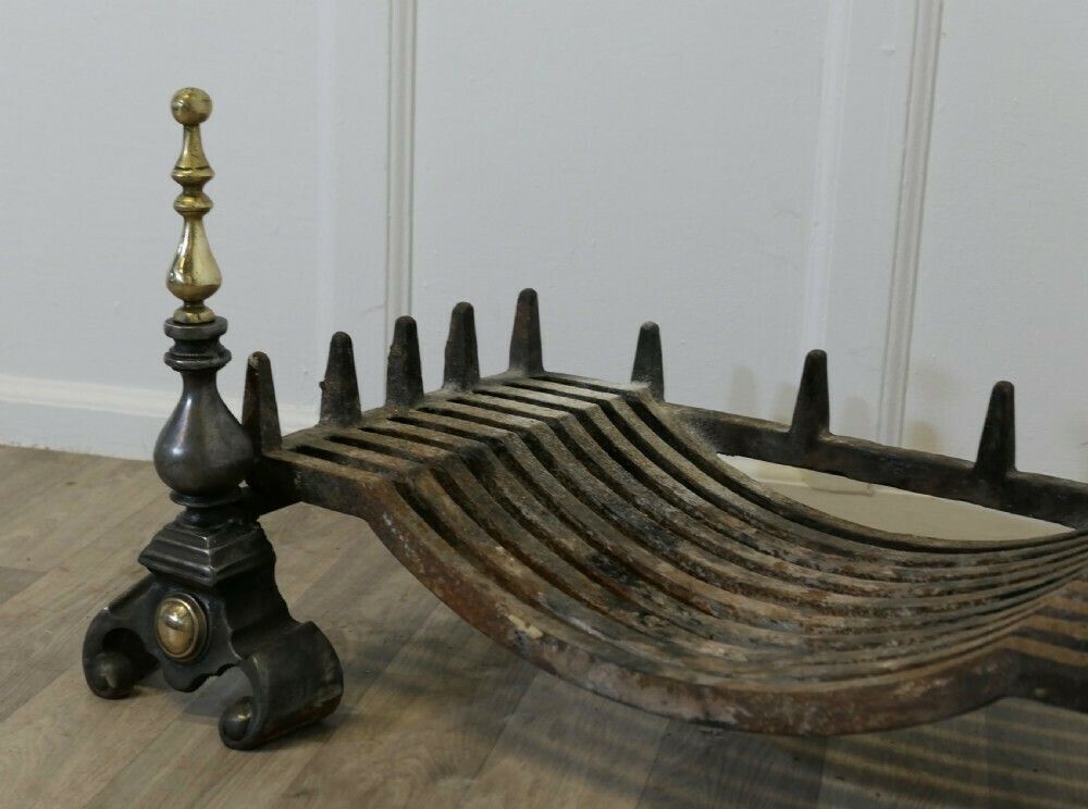 Large Polished Steel And Brass Log Grate On Andirons photo 780.0