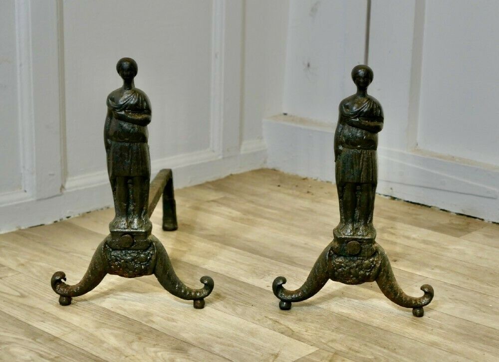 A Pair Of French Gothic Iron Andirons With Guardians