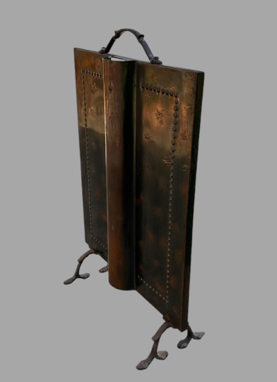 An Early 20th Century Hammered Copper Fire Guard photo furniture