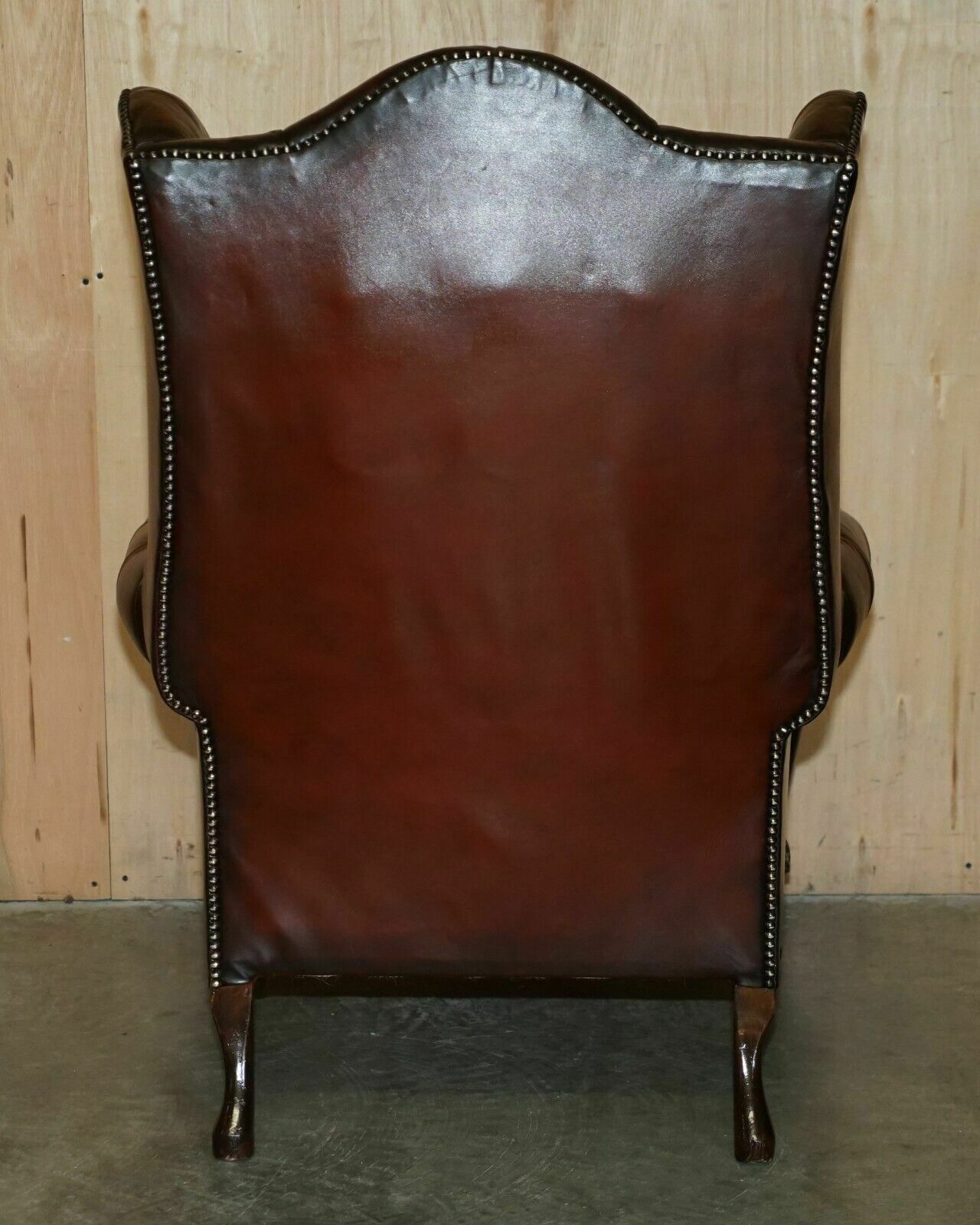 Furniture Pair Of Chesterfield Vintage Oxblood Leather Wingback Armchairs & Footstools photo
