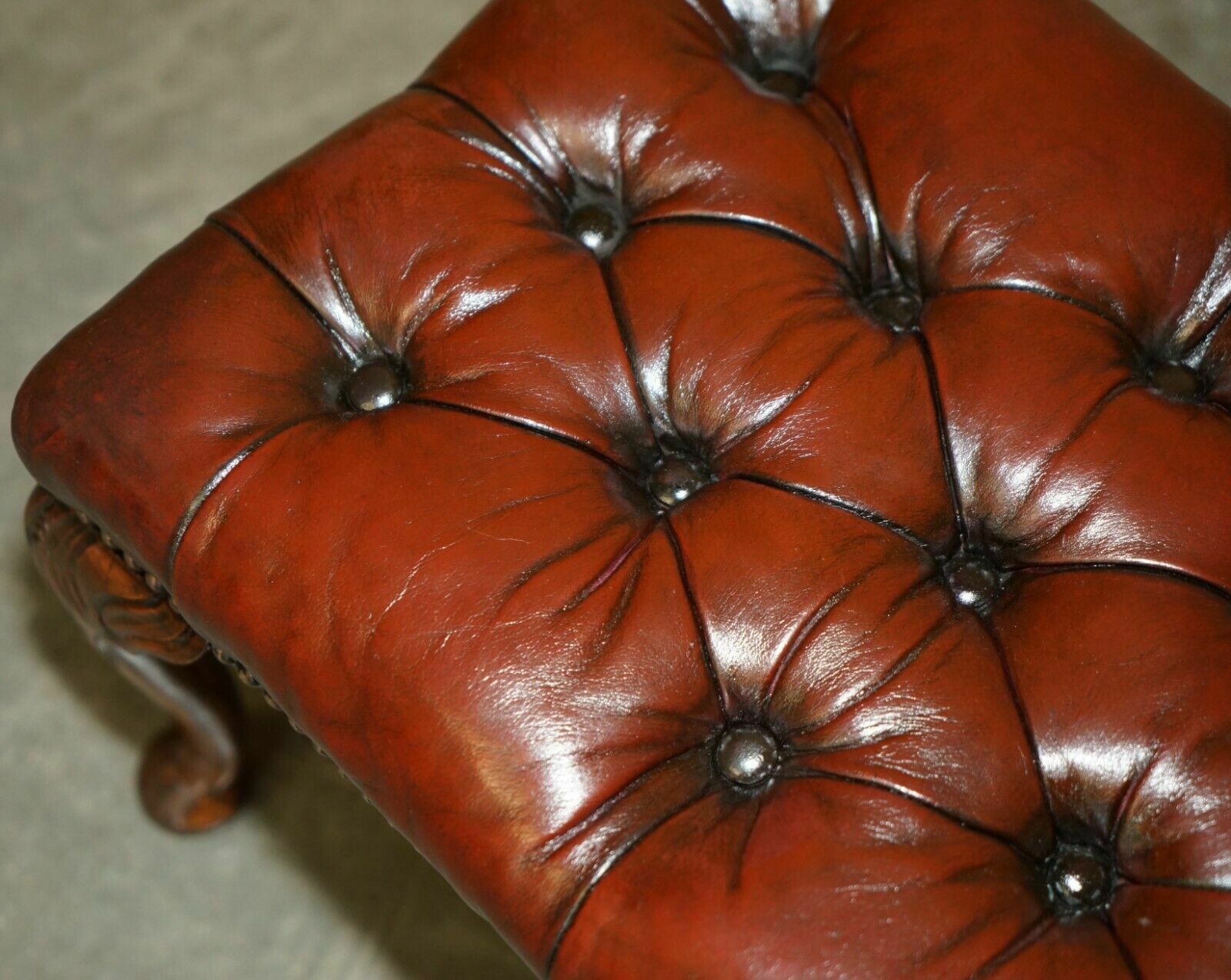 photo vintage Pair Of Chesterfield Vintage Oxblood Leather Wingback Armchairs & Footstools