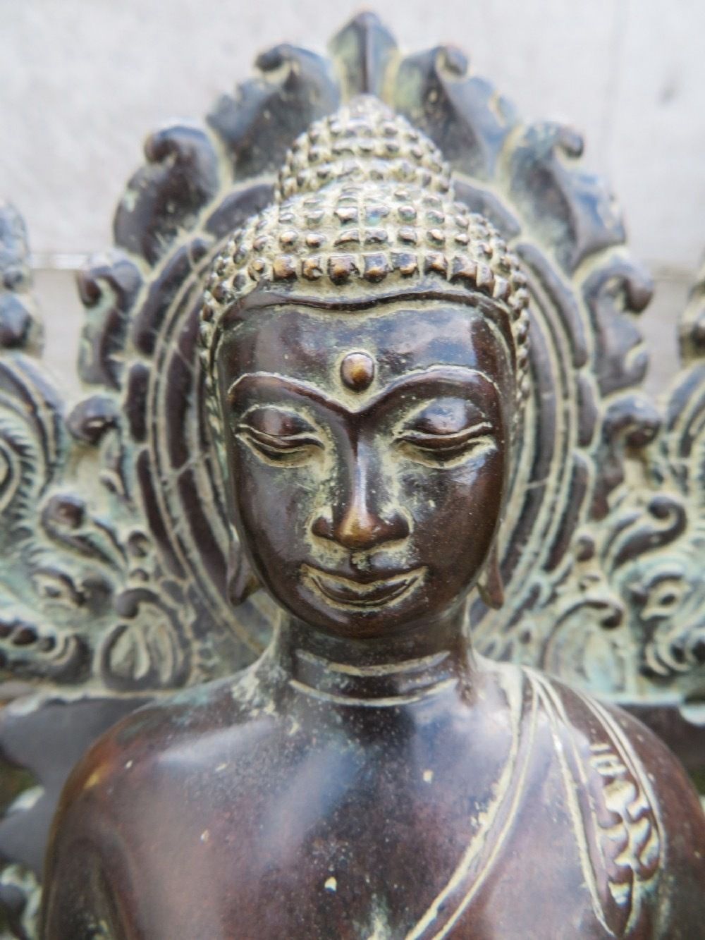 A Copper Alloy Seated Figure Of Buddha In The European Fashion. Indonesian Archipelago,Central Java. Circa Early 15th Century.. photo furniture
