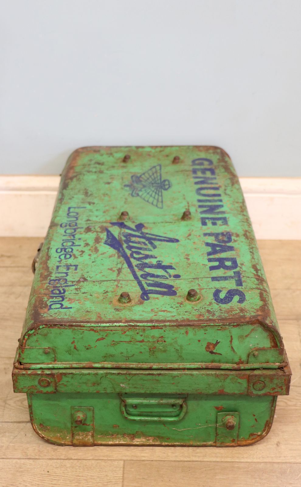 A Lovely Vintage Metal Trunk That Has Been Hand Sign Written With The Emblem For Austin Cars. photo Furniture