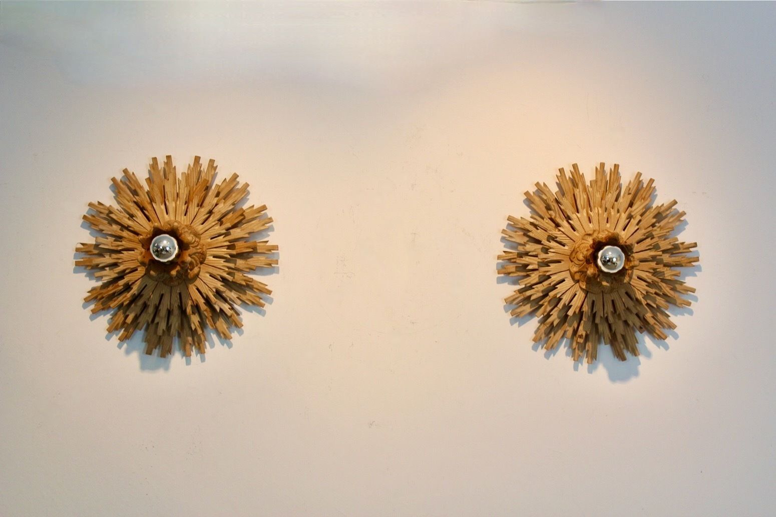 Natural Pair Of Large Carved Sunburst Wooden Sconces photo for sale