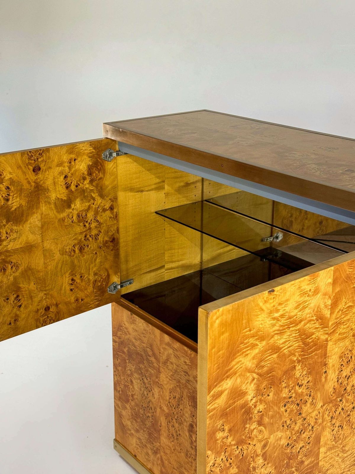photo furniture Exclusive Lacquered Burlwood And Brass Bar Cabinet, 1970s