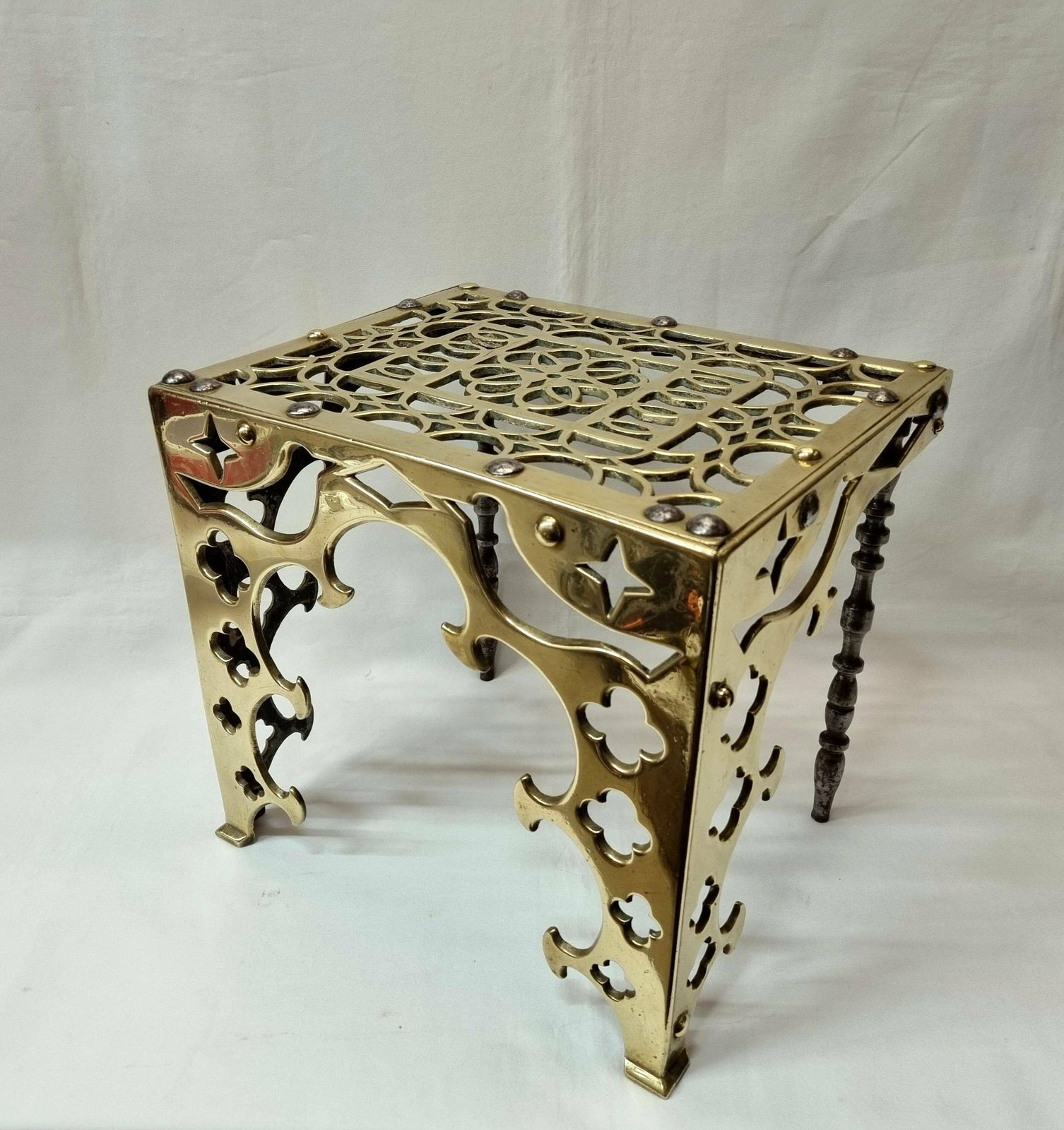 A Beautiful And Exceptional 'Gothic Revival' Brass Footman Trivet Of Very Heavy Gauge Brass & Steel Construction.