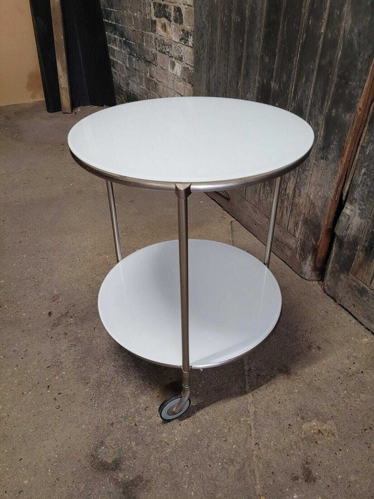 photo furniture Vintage Ikea Strind White Glass & Metal Rolling Side Table