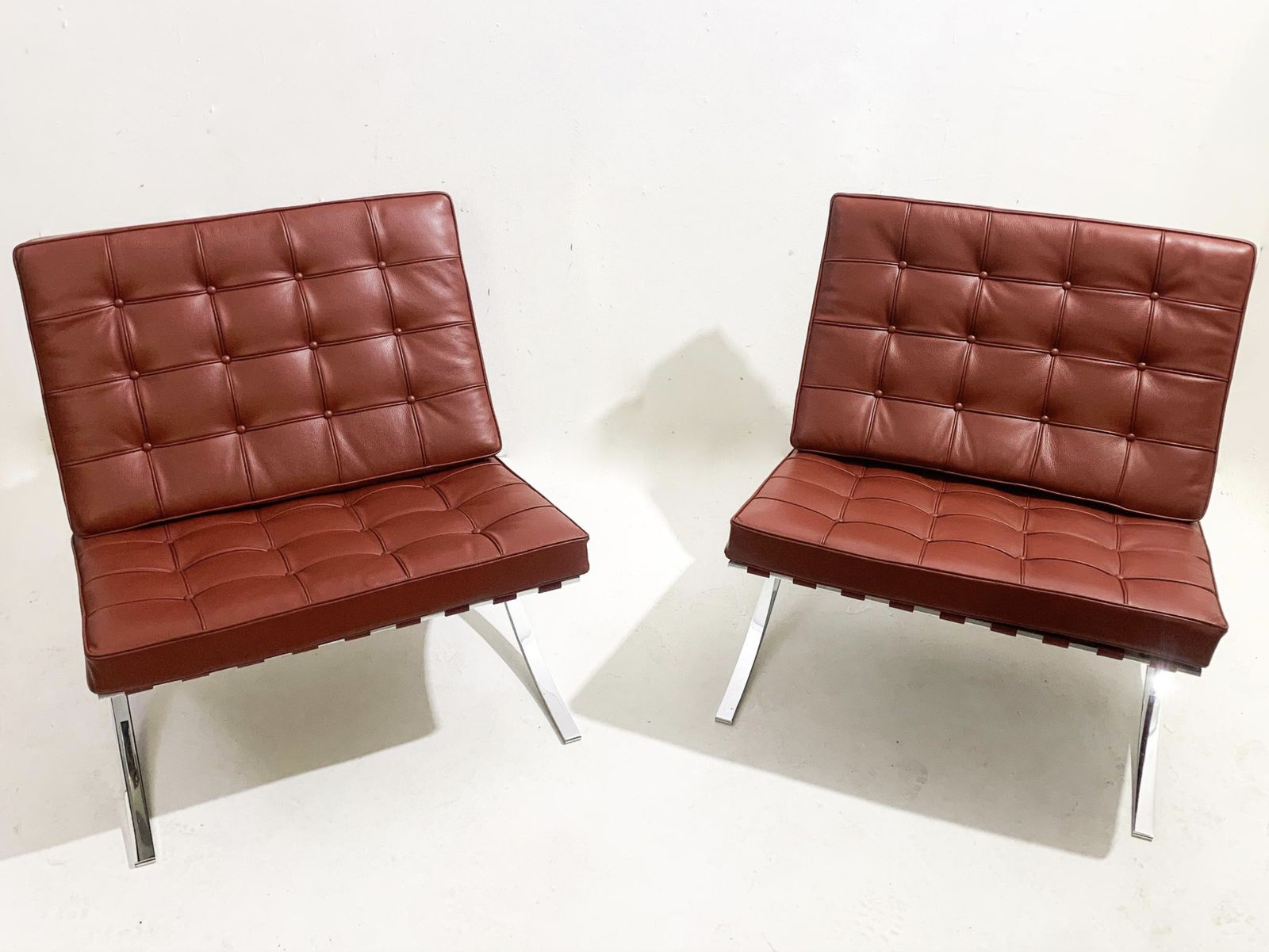 Pair Of Burgundy Leather Barcelona Chairs By Mies Van Der Rohe For Knoll, 1990s photo for sale