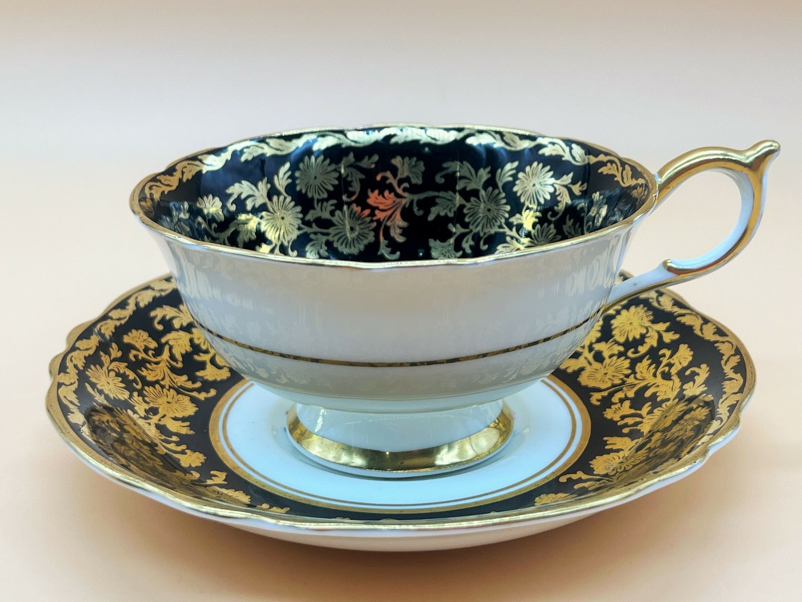 photo furniture Paragon China Double Warranty Queen Mary Black And Gold With Pink Chintz Centre Tea Cup And Saucer Duo. No. 1334.