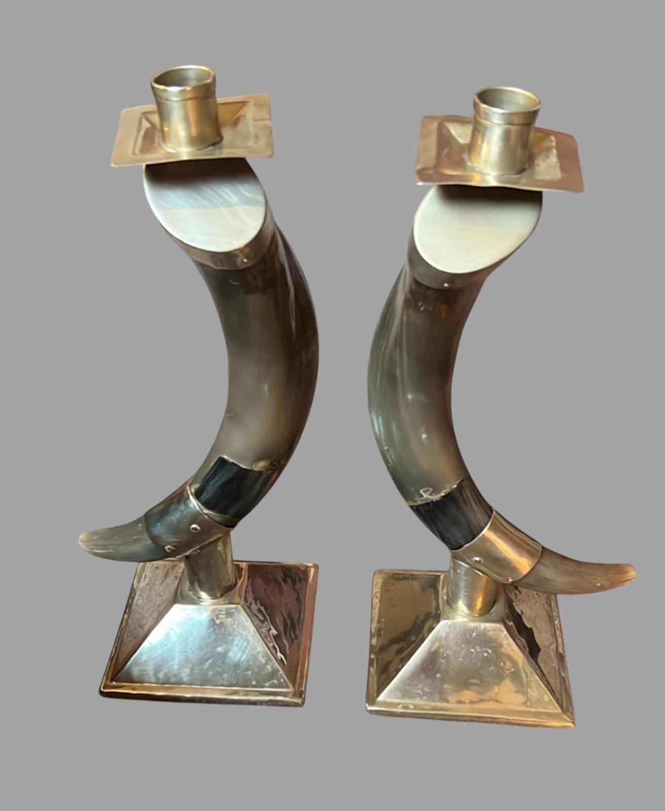 A Pair Of South American Alpaca And Horn Candlesticks