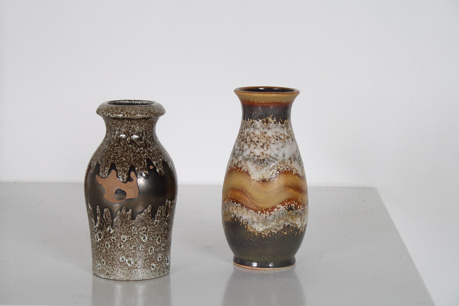 Home Decor A Pair Of West German Pottery Lava Vases In Earthy Vibrant Tones photo