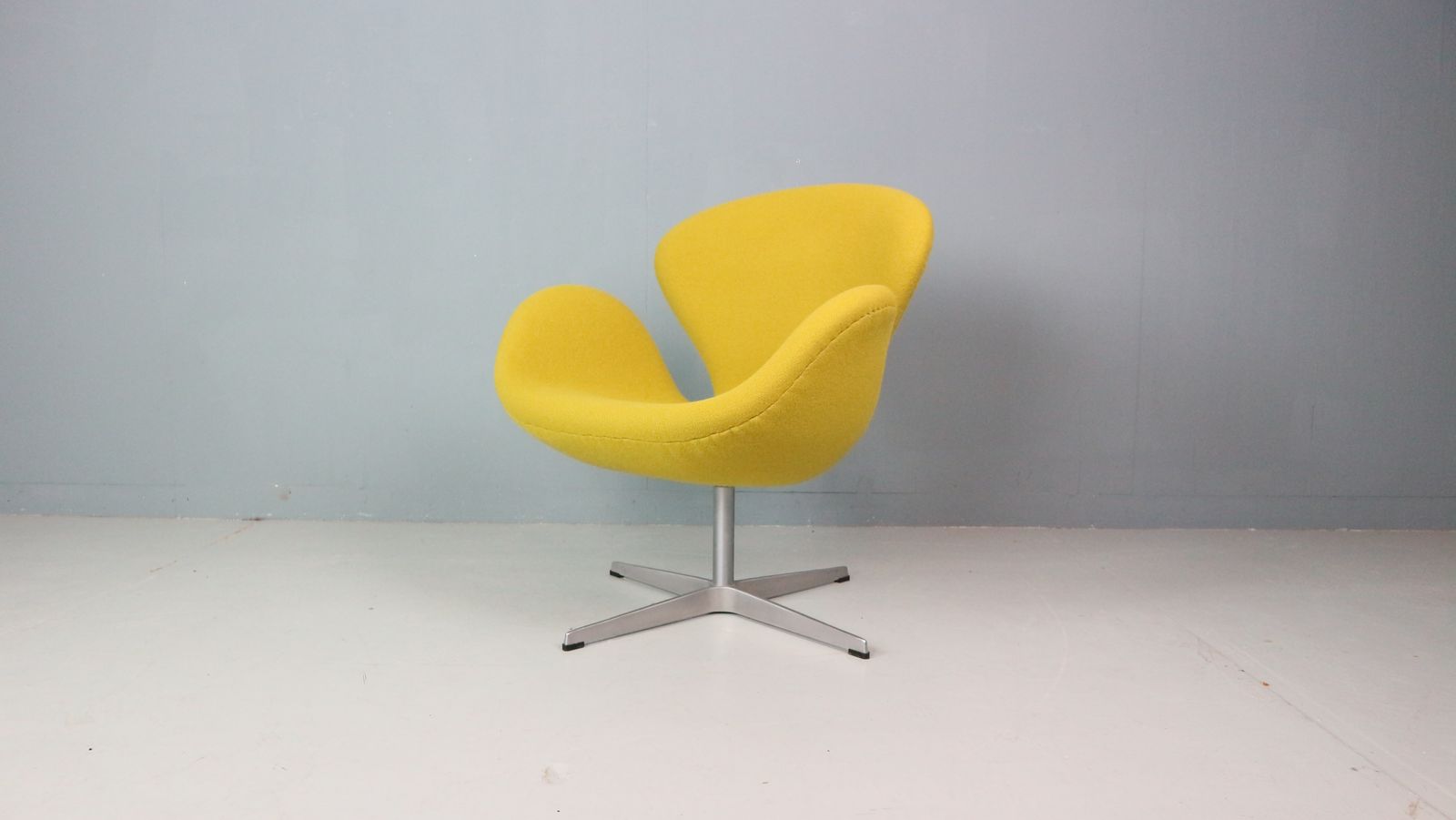 Swan Chair In Yellow Designed By Arne Jacobsen And Fritz Hansen photo vintage