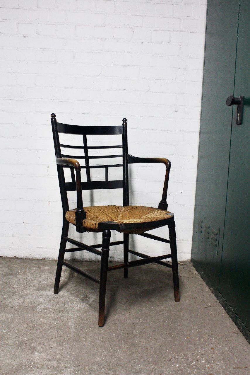An Ebonised Ash Sussex Chair By Morris & Co