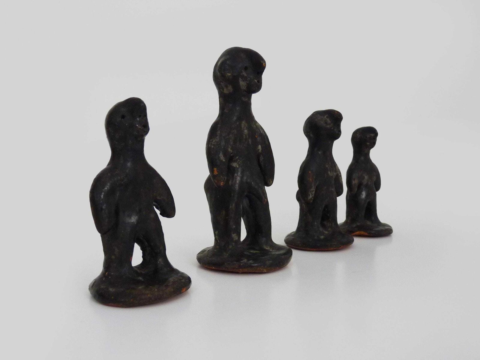 Set Of 4 Brutalist African Style Terracotta Sculptures. 60s photo Art