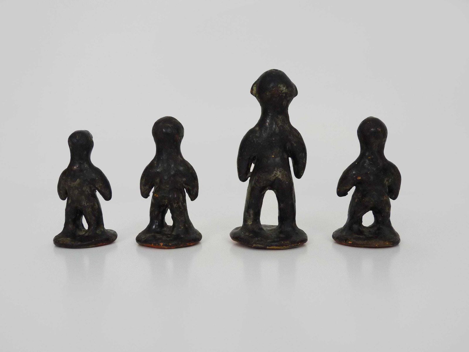 Set Of 4 Brutalist African Style Terracotta Sculptures. 60s photo vintage