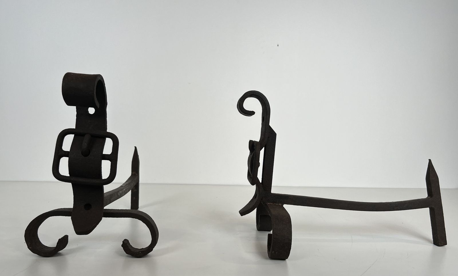 Pair Of Modernist Andirons Representing A Belt photo 1250.0