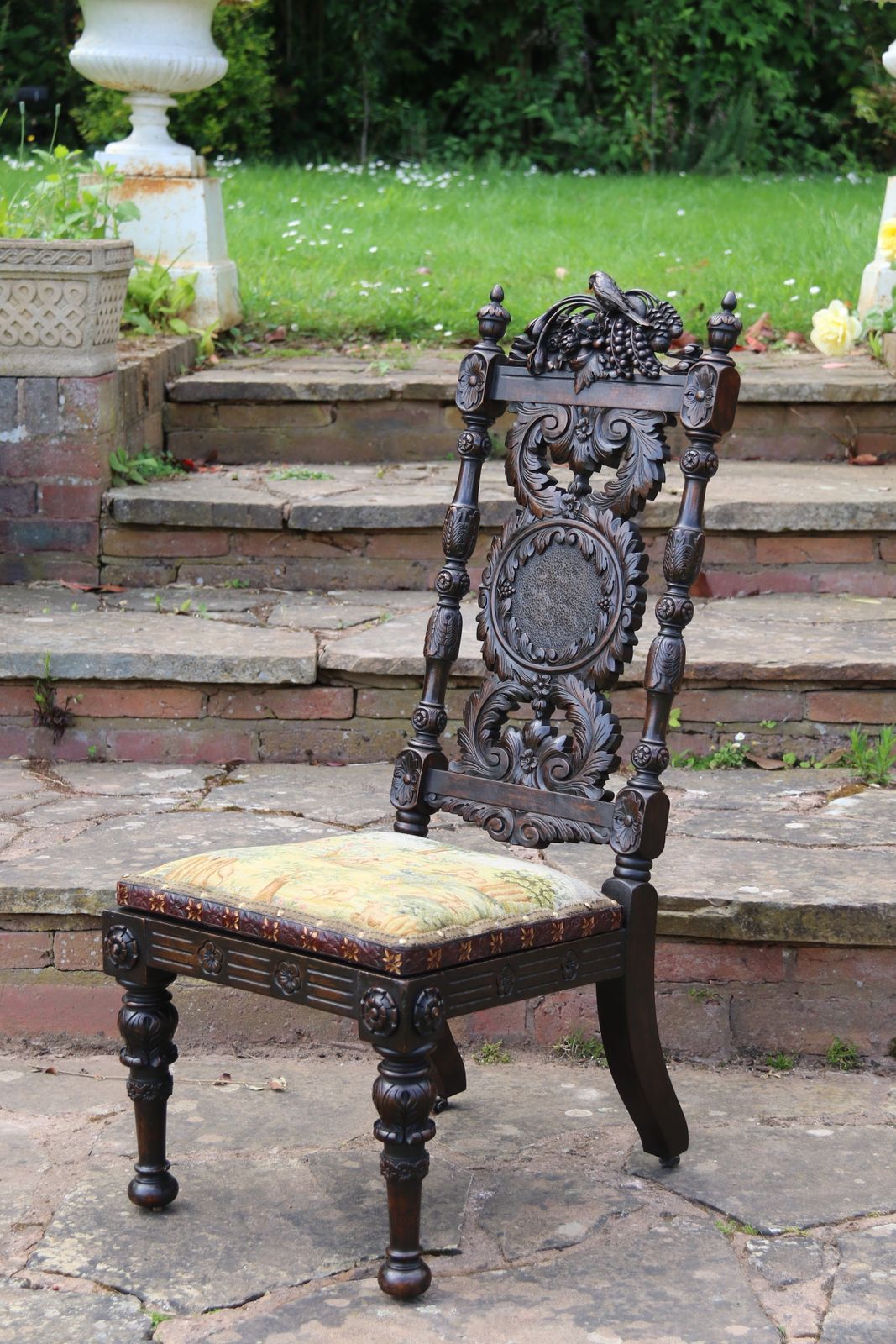 photo buy A 19th Century English Country House Carved Walnut High Backed Chair With A Tapestry Seat