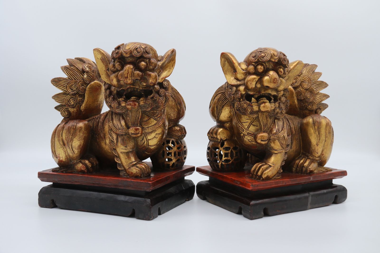 A Highly Decorative Pair Of Carved Gilt Wood And Lacquer Chinese Buddhist Lions Circa 1900 photo vinterior