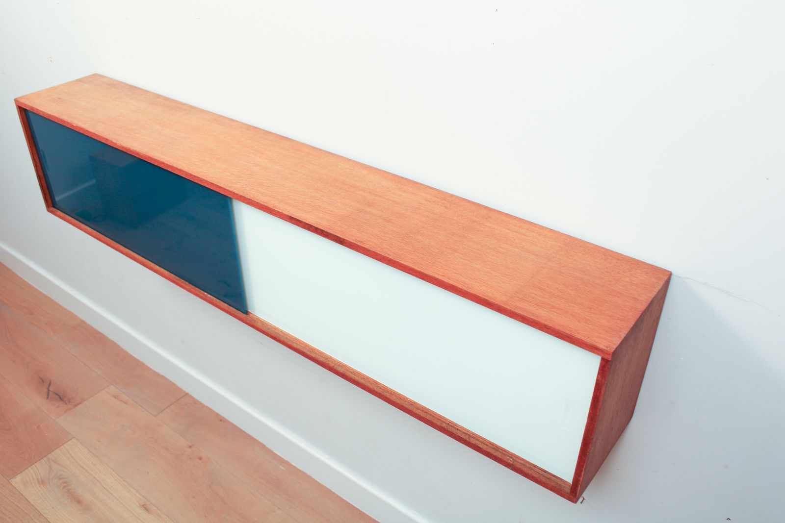 photo furniture A Vintage Mid Century Wall Hung Oak Cabinet, Blue & White Sliding Glass Doors