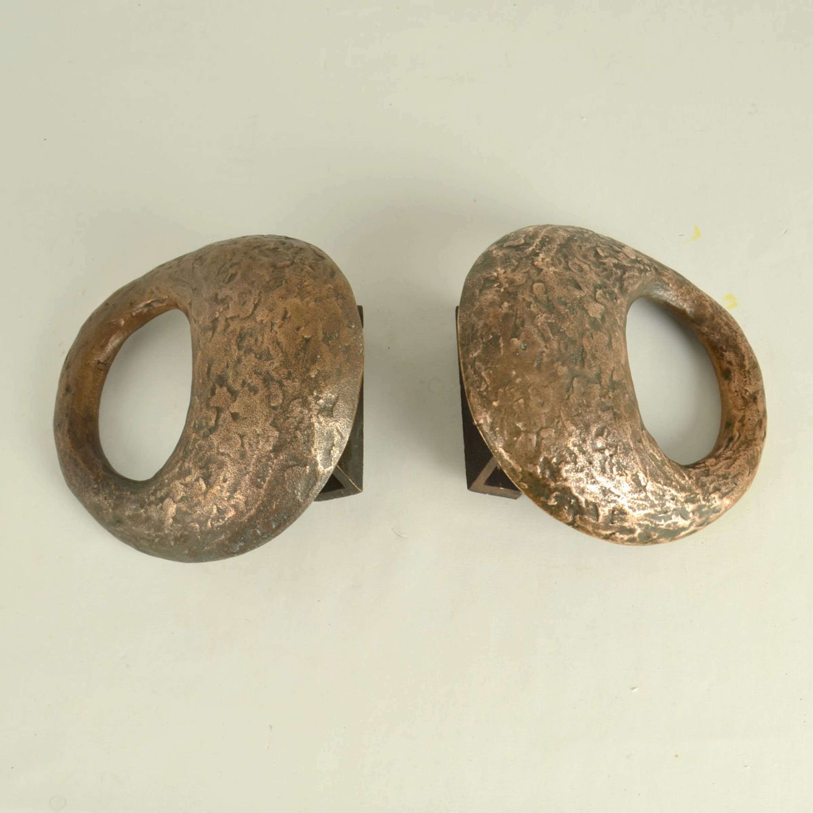 Pair Of Round Bronze Relief Door Handles With Oval Grip photo for sale