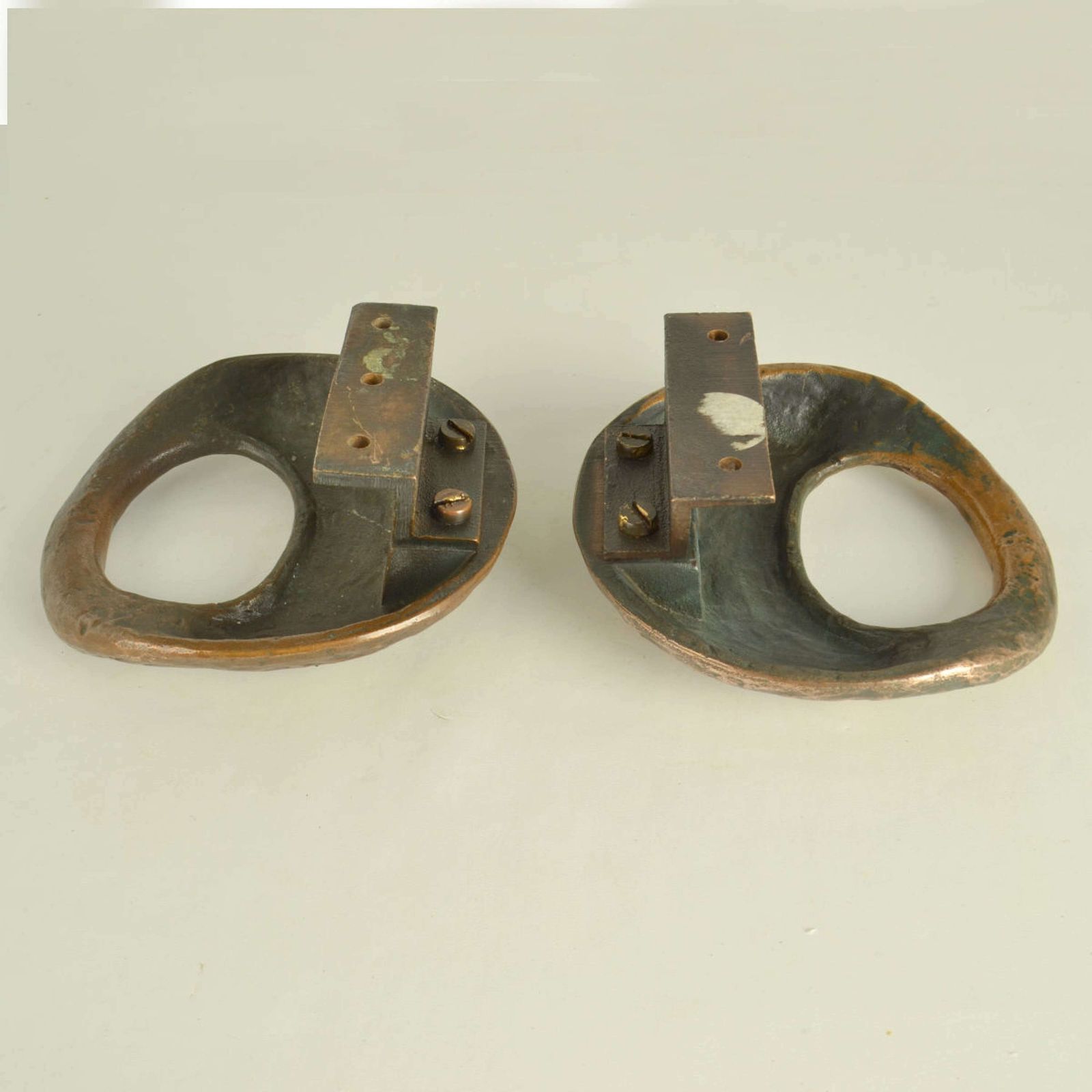 photo for sale Pair Of Round Bronze Relief Door Handles With Oval Grip