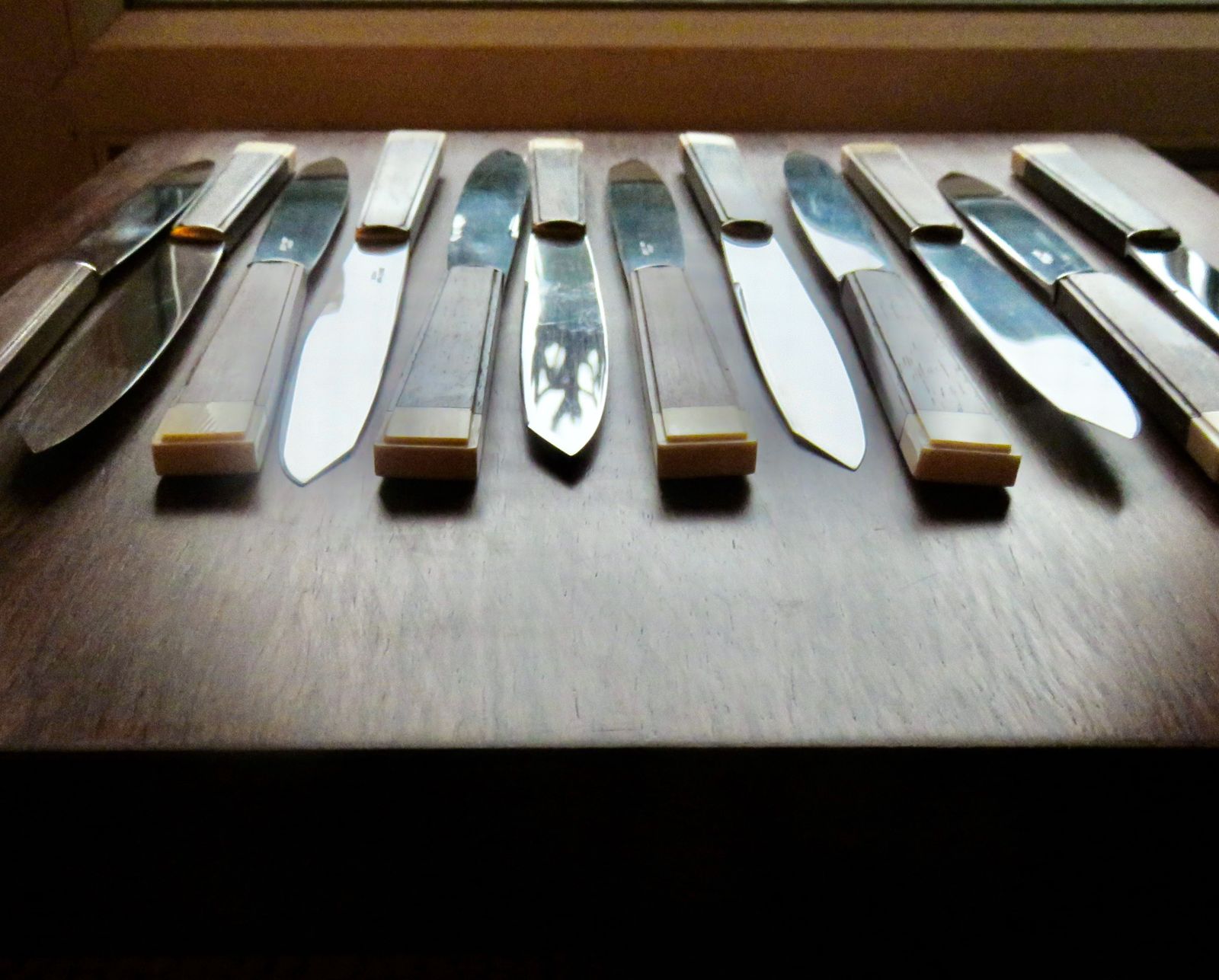 Set Of 12 Art Deco Knives With Exotic Wood And Ivory Handles. France 1940 photo for sale