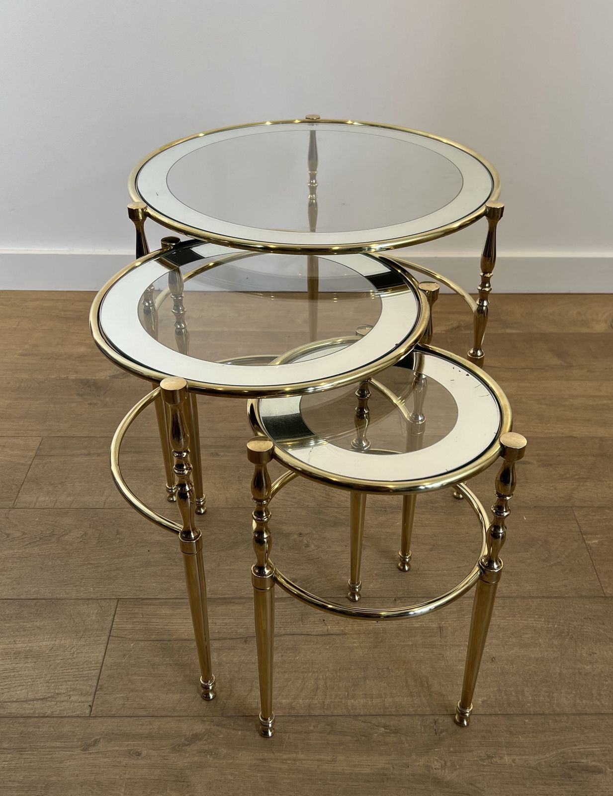 photo buy Set Of 3 Round Brass Nesting Tables With Glass Tops And Silver Rims