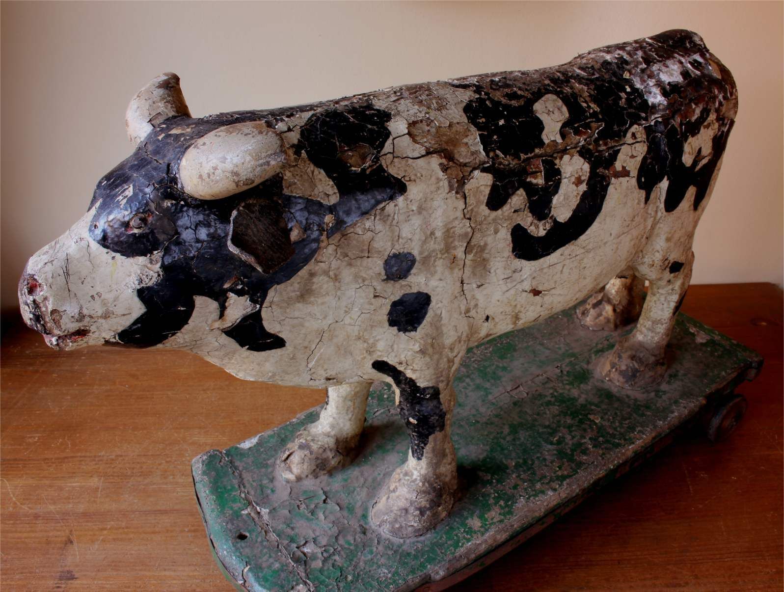 Home Decor Antique Wooden Folk Art Cow Trolley. Rustic French Butchers Shop Display. photo