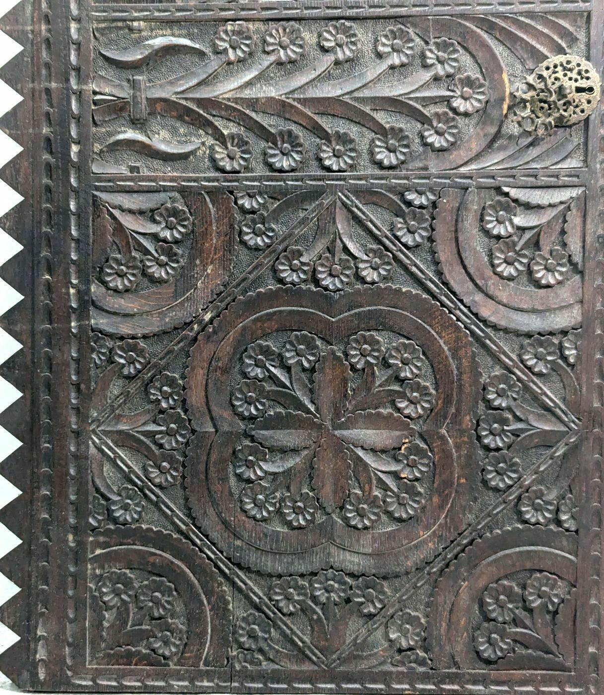 Carved Blackened Wooden Door photo for sale