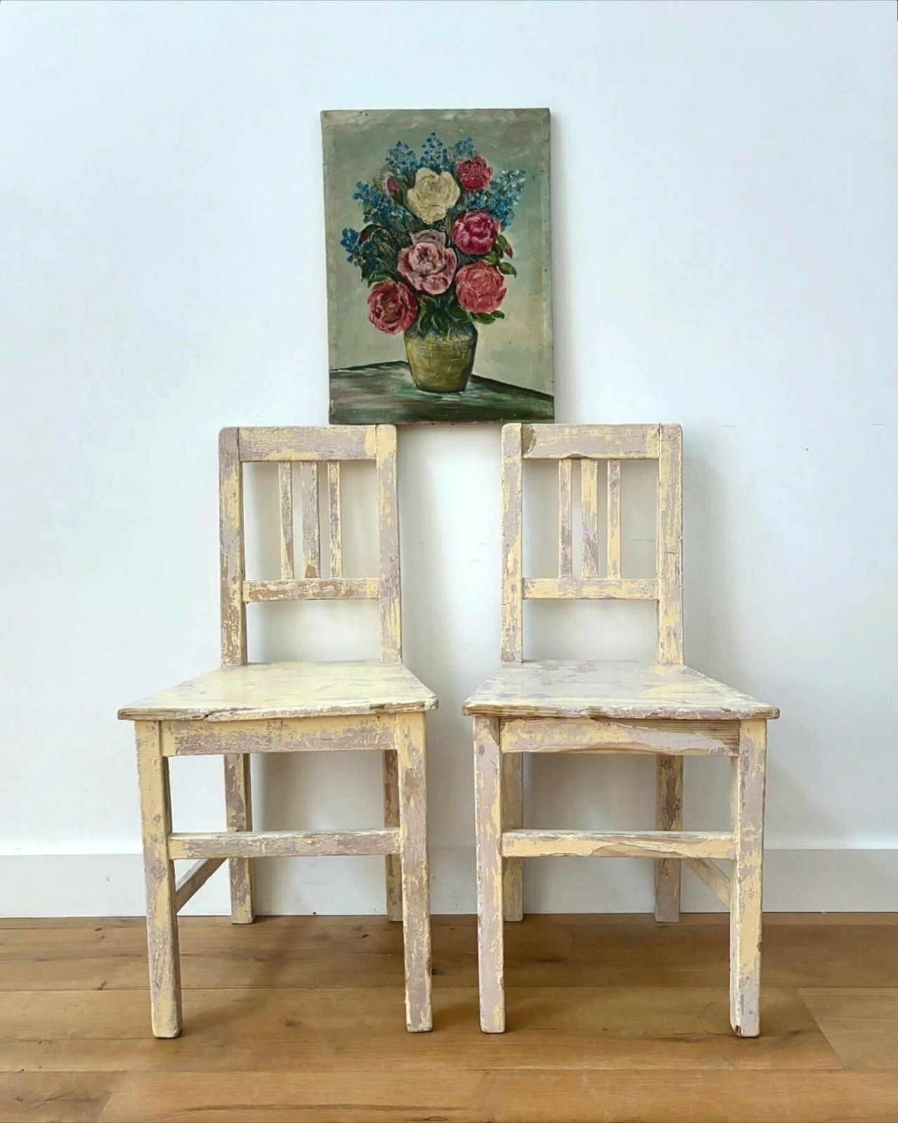 A Pair Of French Painted Chairs