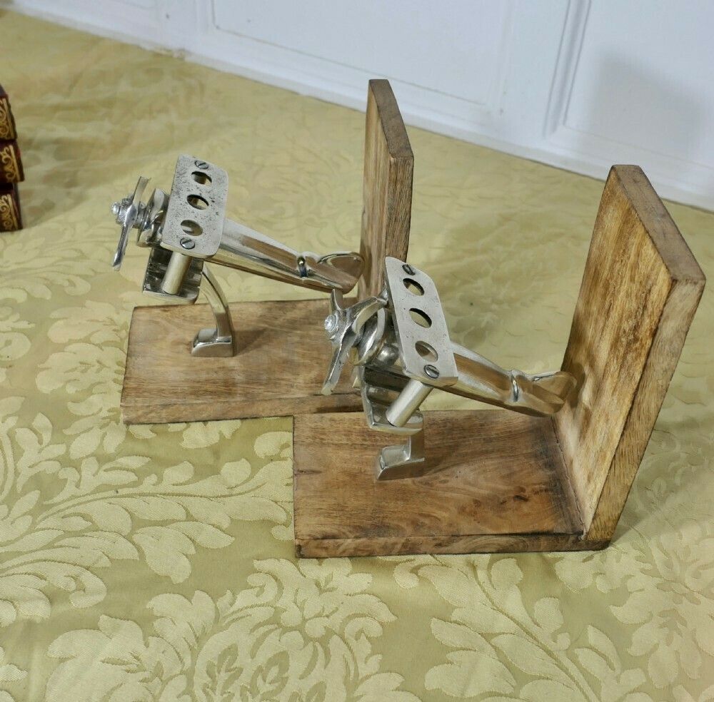 A Pair Of Mid Century Quirky Bookends On An Aeronautical Theme photo buy