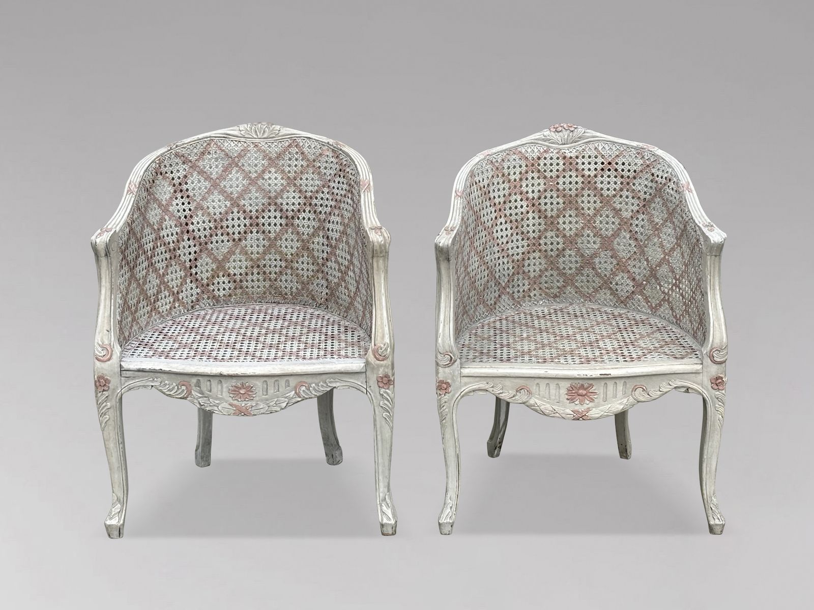 Pair Of French Louis XV Style Painted And Cane Bergère Armchairs photo for sale
