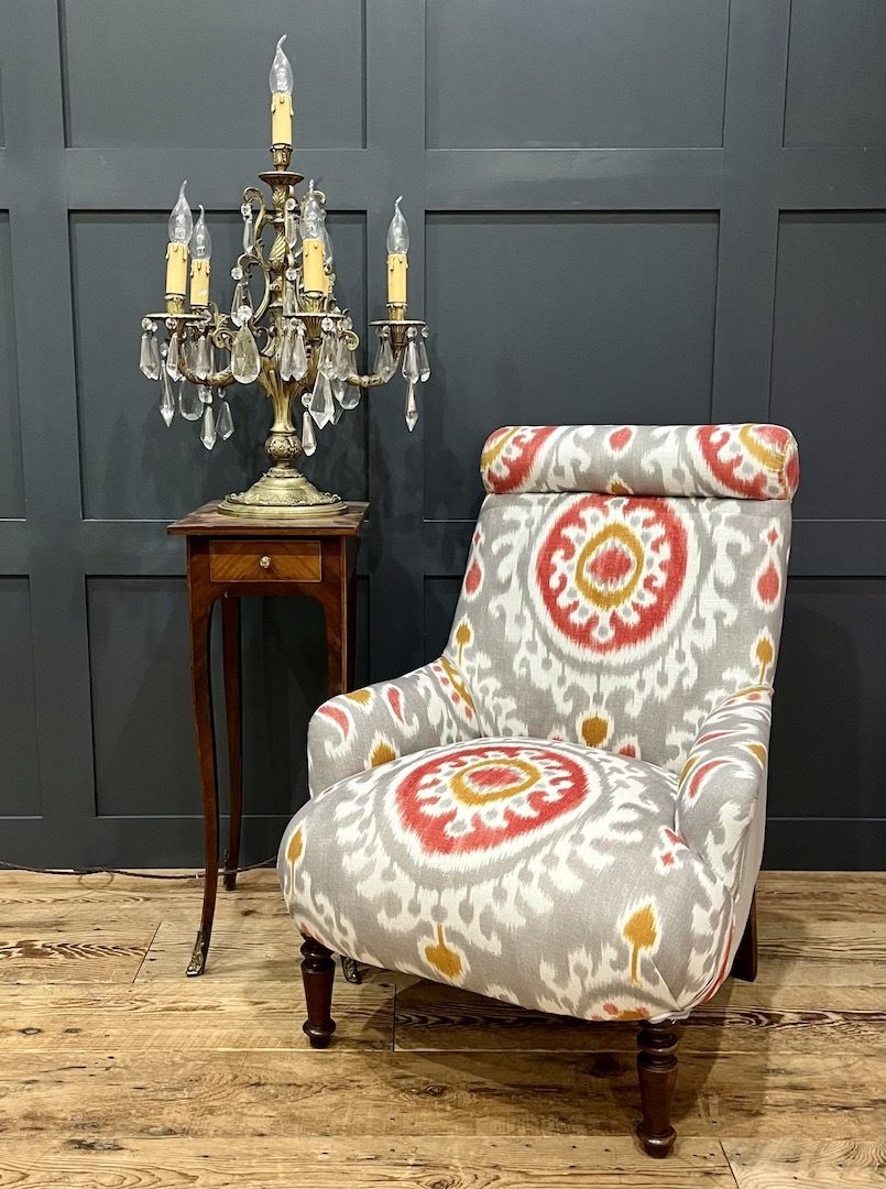 An Early 20th Century French Roll Top Bedroom Chair
