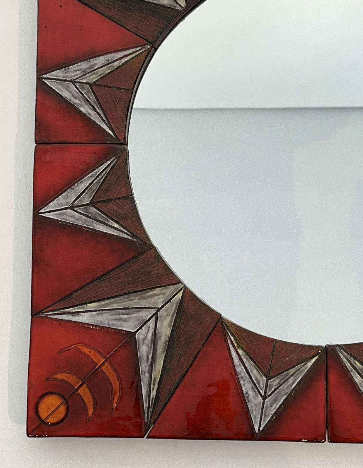 photo furniture Ceramic Mirror Depicting A Stylized Sun On A Red Background Attributed To Oswald Tiberghien