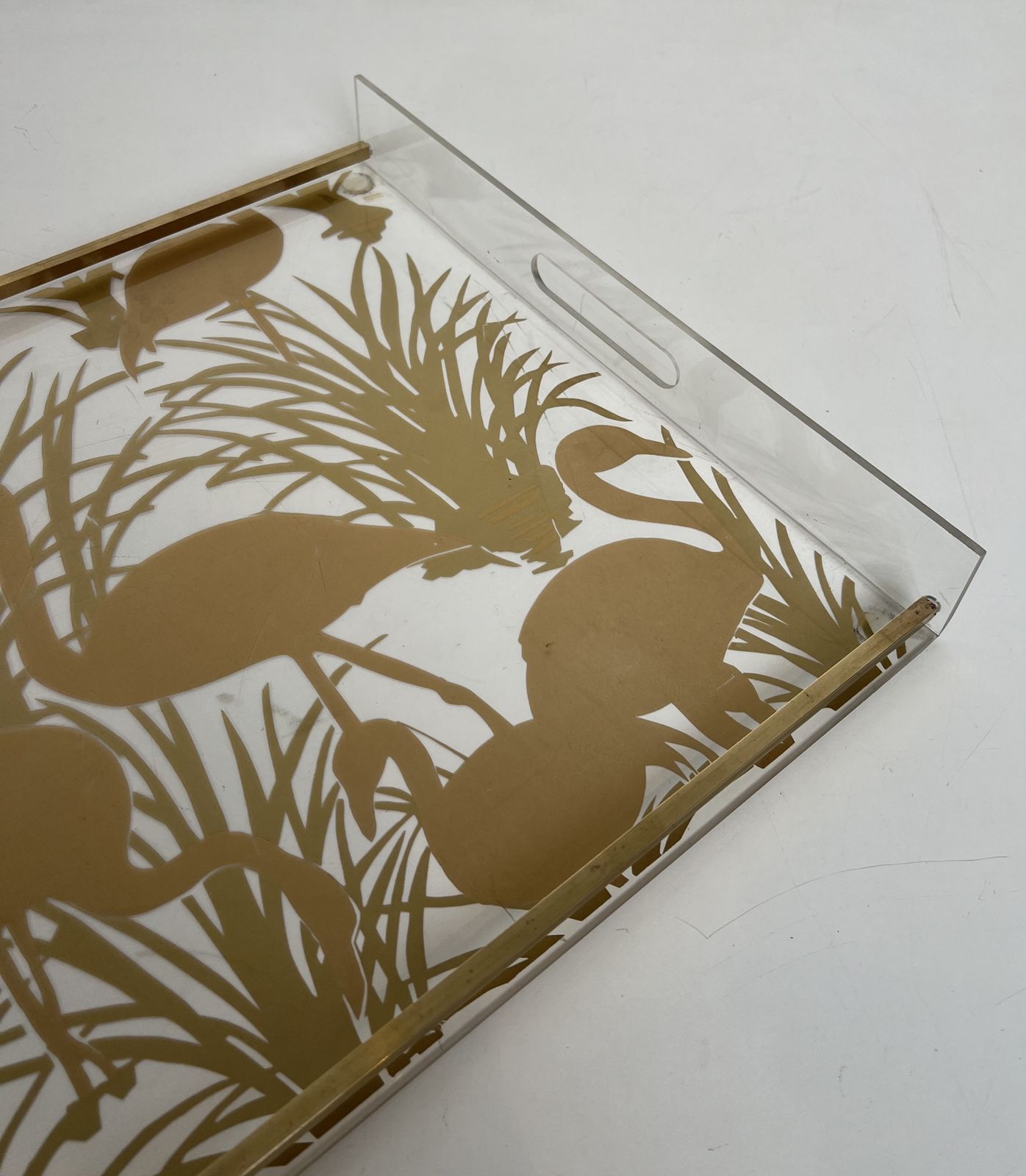 photo vintage Pair Of Plexiglass And Brass Trays With Golden Bird Decor