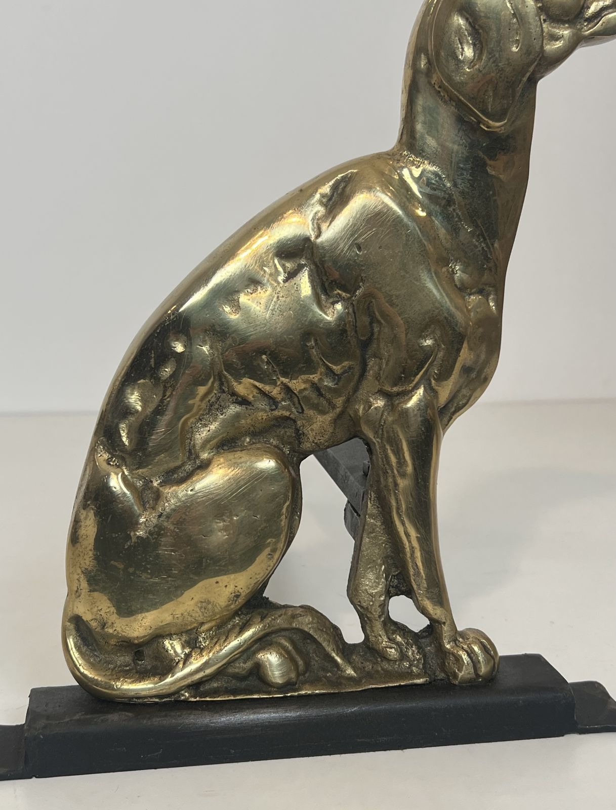 photo for sale Pair Of Chiseled Bronze Andirons Representing Dogs From The Art Deco Period