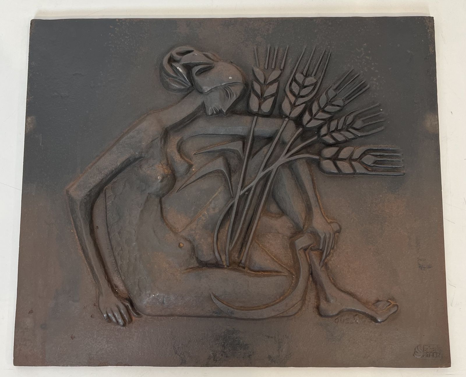 Modernist Cast Iron Fireplace Plate Depicting A Nude Woman Holding A Scythe And Ears Of Wheat