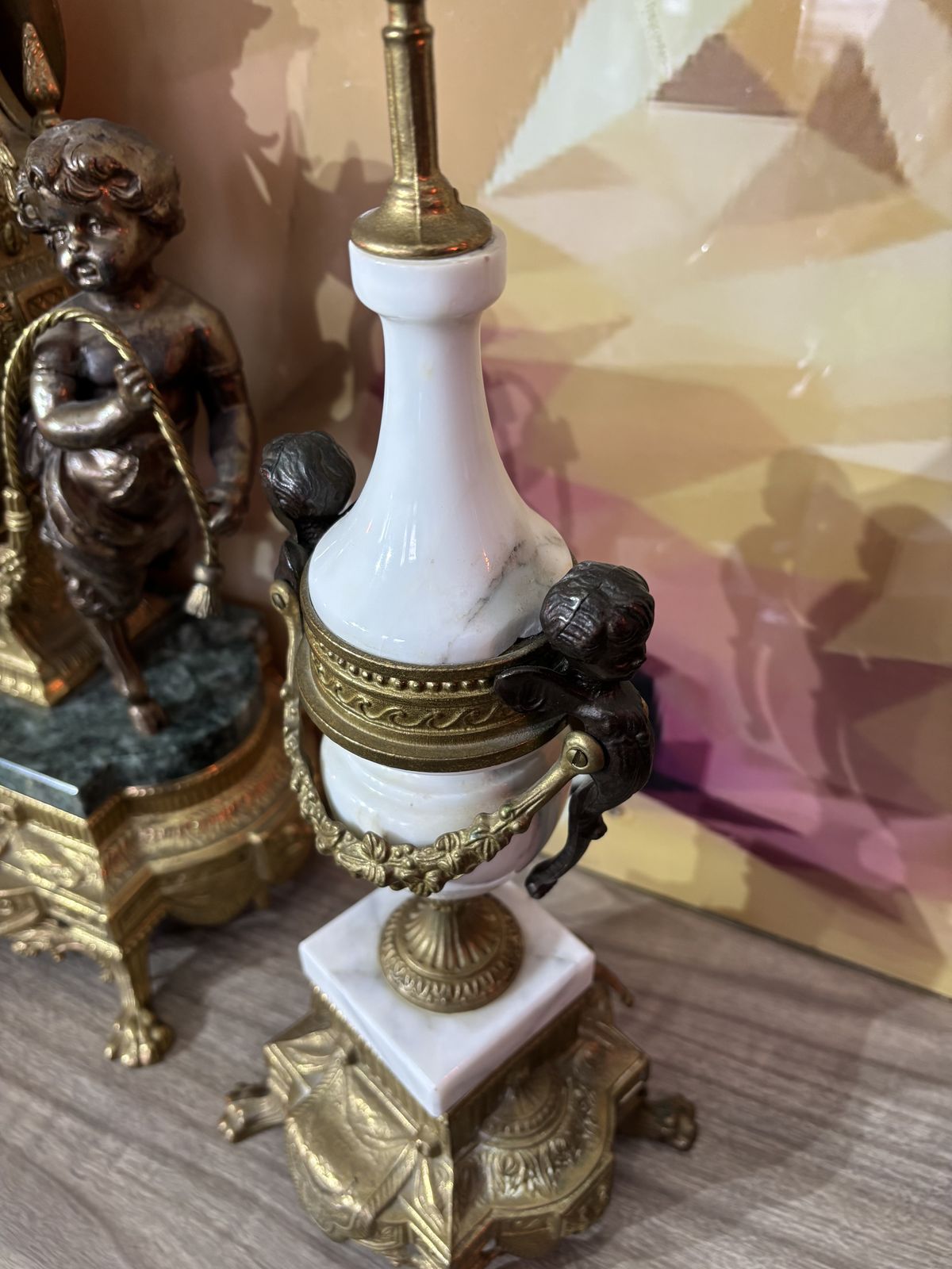 Pair Of Marble And Brass Clock Garnitures With Cherubs photo for sale