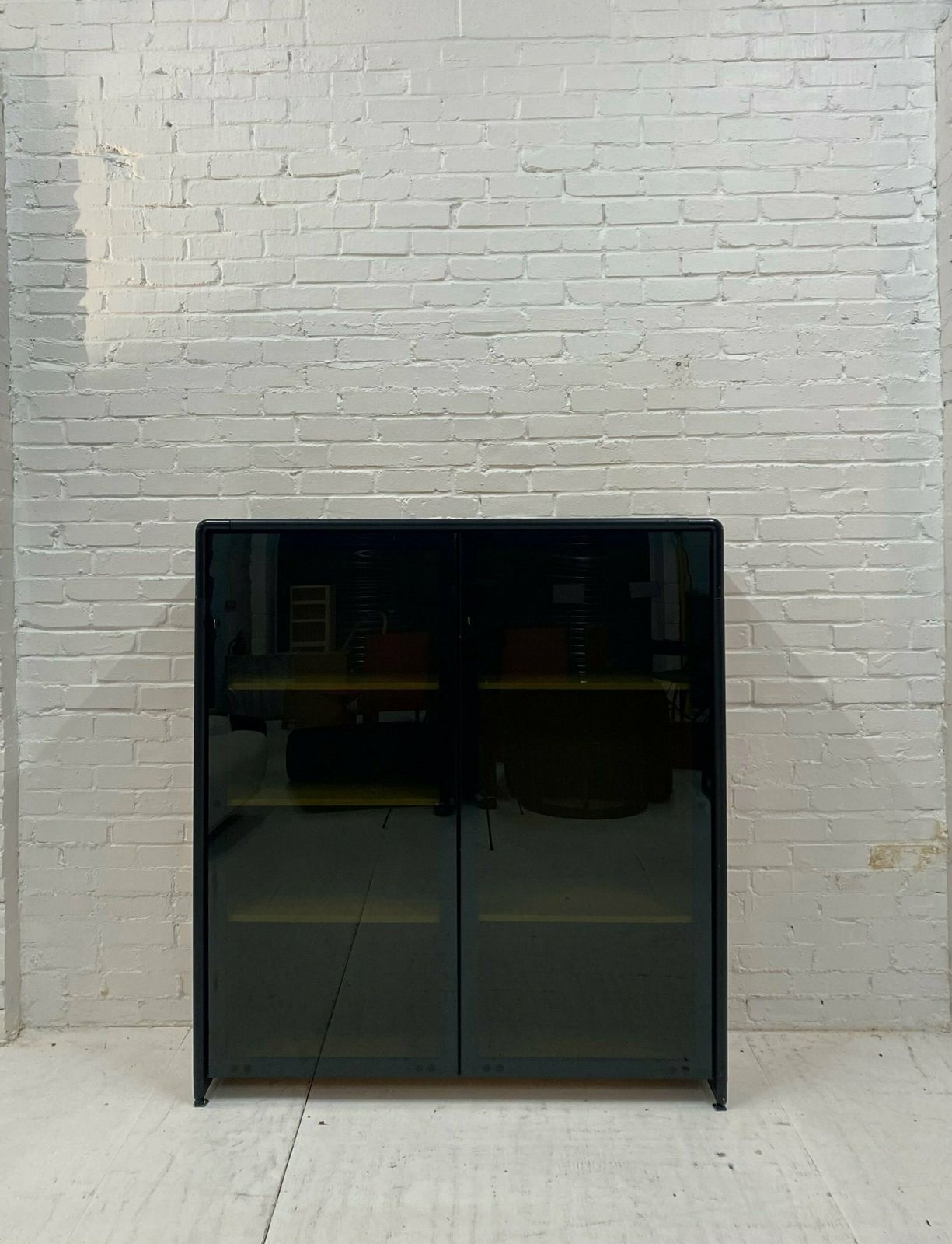 photo furniture Mid Century Unifor Smoked Glass Cabinet, 1980.