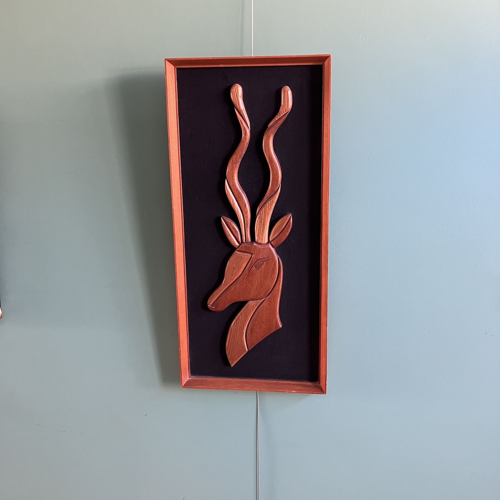 A Mid Century Teak Picture Of A Deer In A Teak Frame On Black Background photo 60.0