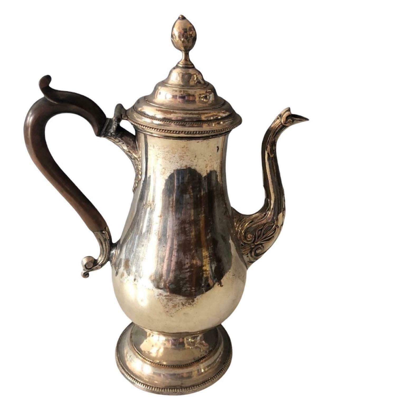 An 18th Century George III Old Sheffield Plate Coffee Pot Of Simple Form, Circa 1770.