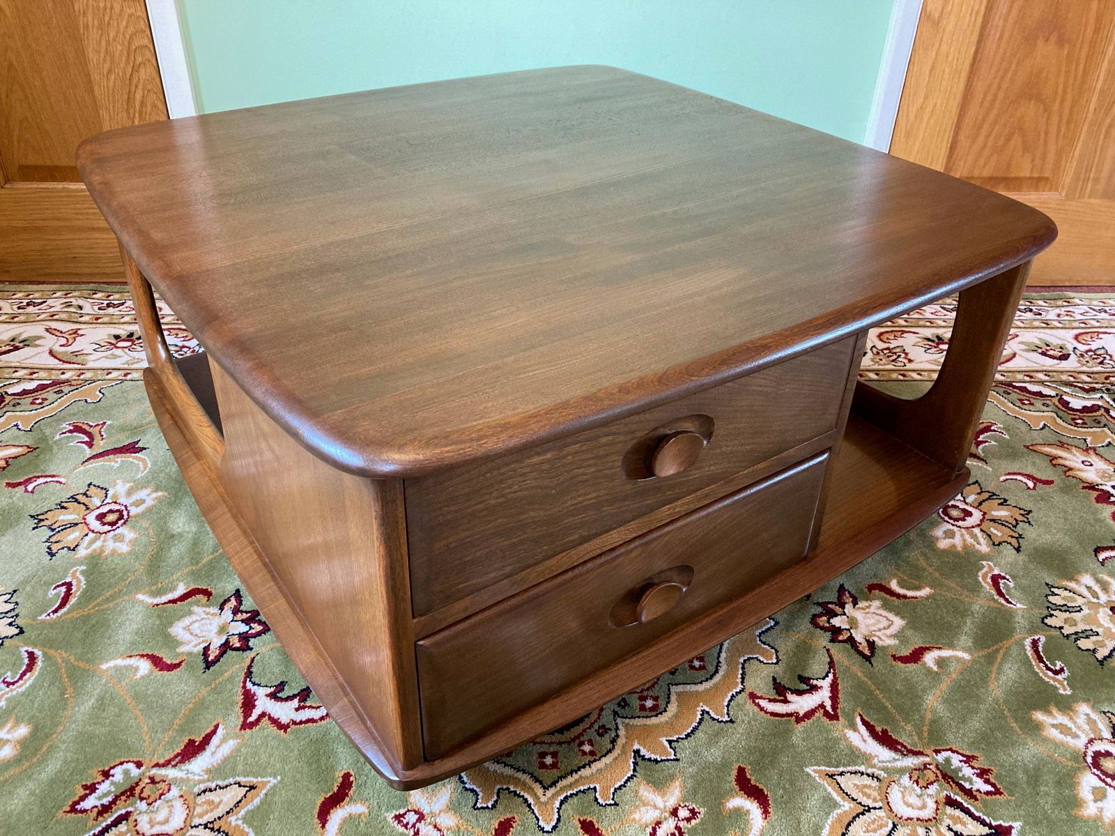 An Ercol Pandora Coffee Table In Golden Dawn Colour. photo furniture
