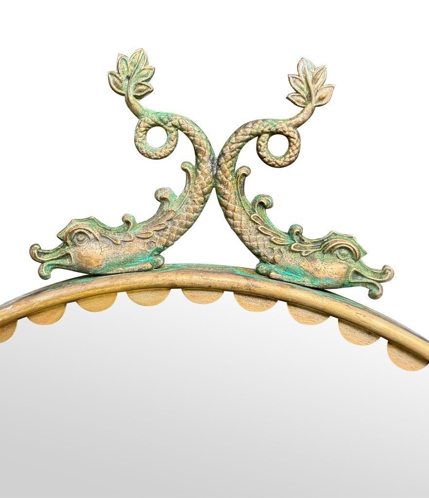 photo furniture A Pair Of Italian 1940s Oval Mirrors With Dolphin Detailing Around The Brass Frame