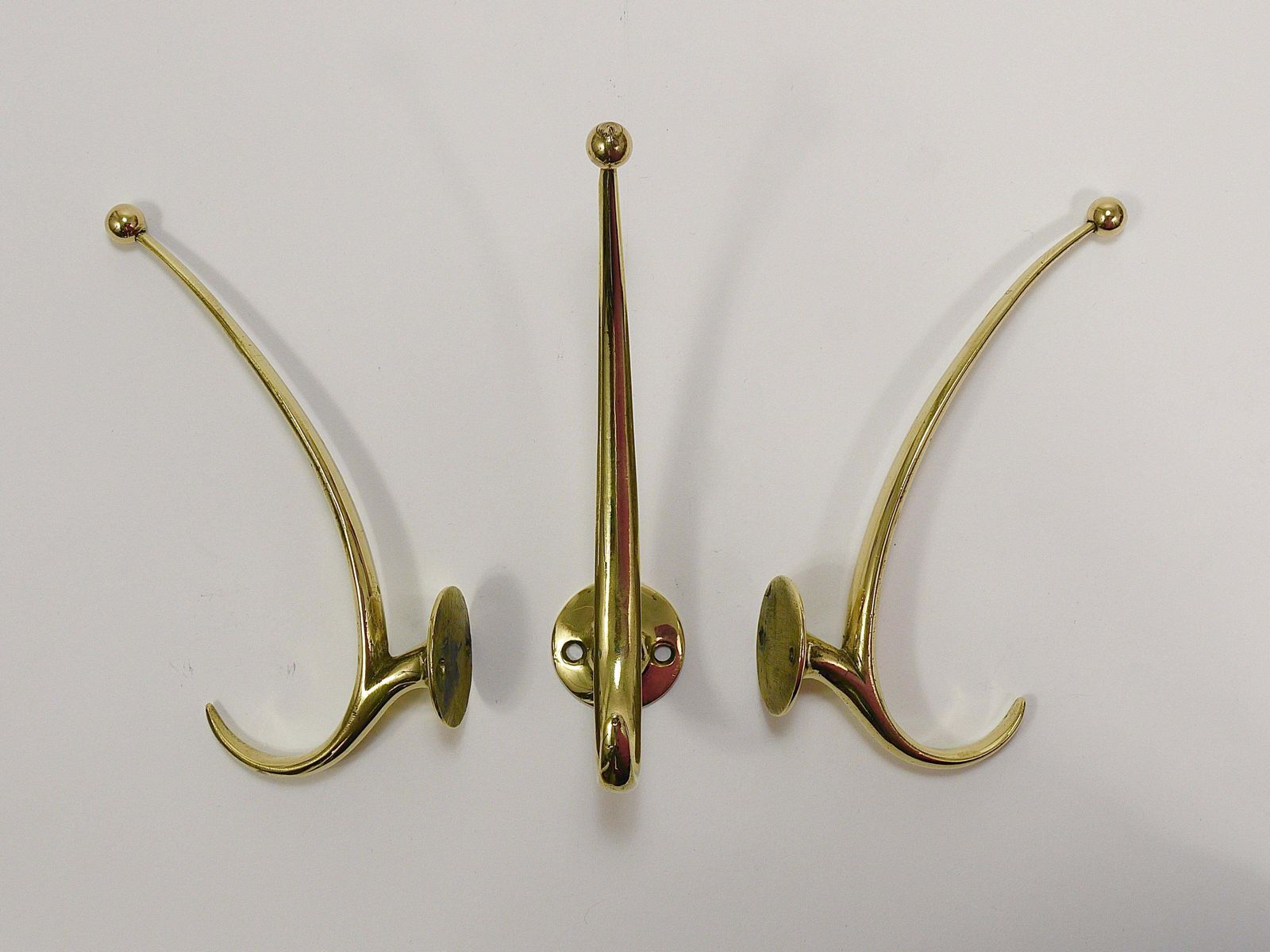photo for sale Two Franz Hagenauer Vienna Mid Century Curved Brass Wall Coat Hooks, 1950s