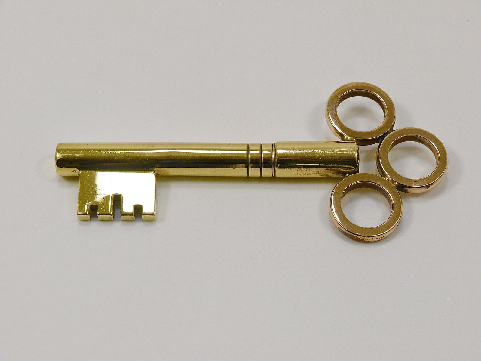 photo furniture Large Carl Aubock Brass Key Corkscrew Bottle Opener Paperweight, Austria, 1950s