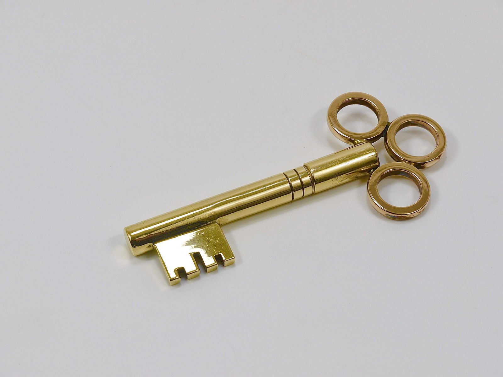 637.0 Large Carl Aubock Brass Key Corkscrew Bottle Opener Paperweight, Austria, 1950s photo