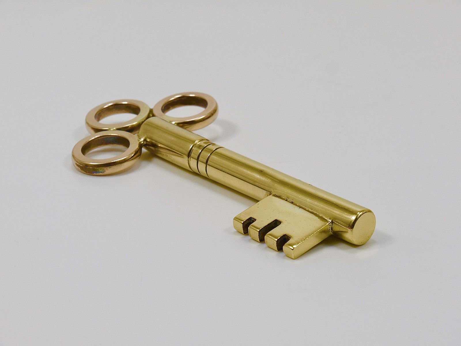 photo buy Large Carl Aubock Brass Key Corkscrew Bottle Opener Paperweight, Austria, 1950s