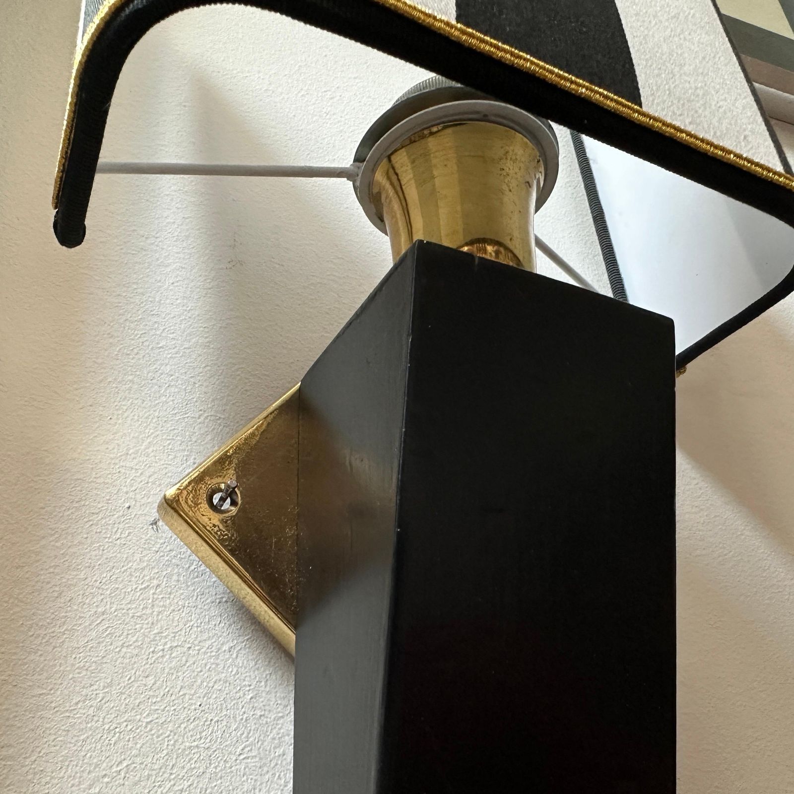 644.0 An Elegant 1980s Art Deco Style Black Painted Wood And Brass Italian Wall Sconce photo